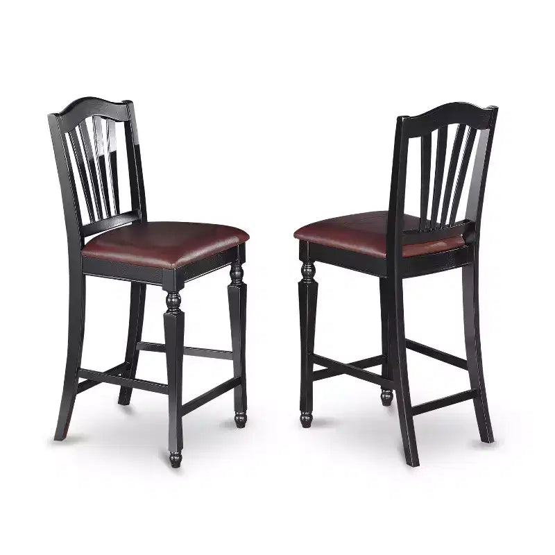 Ensemble de salle à manger HomeStock Belmont avec rallonge intégrée et 8 chaises Parson, finition noire