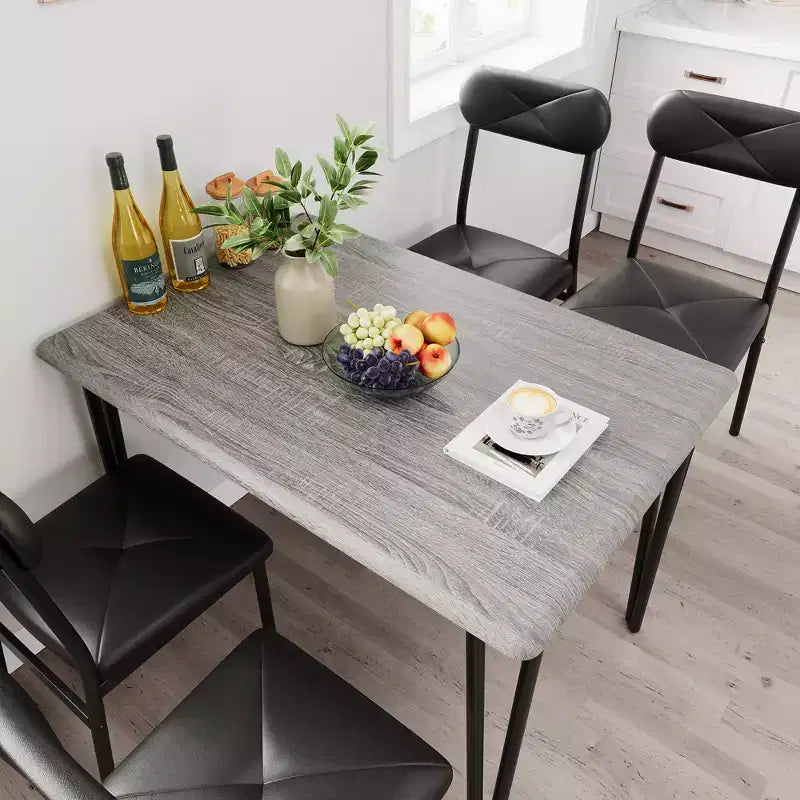 Ensemble de salle à manger 5 pièces pour 4 personnes, ensemble de table à manger moderne, table de dîner avec 4 chaises rembourrées pour petits espaces, appartements, bureaux à domicile.