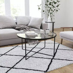 Table basse avec piètement rond en croisillon