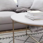 Table basse avec piètement rond en croisillon