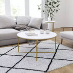 Table basse avec piètement rond en croisillon