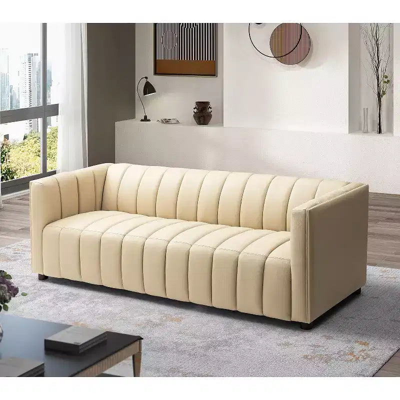 Canapé 83 en cuir véritable avec coutures capitonnées