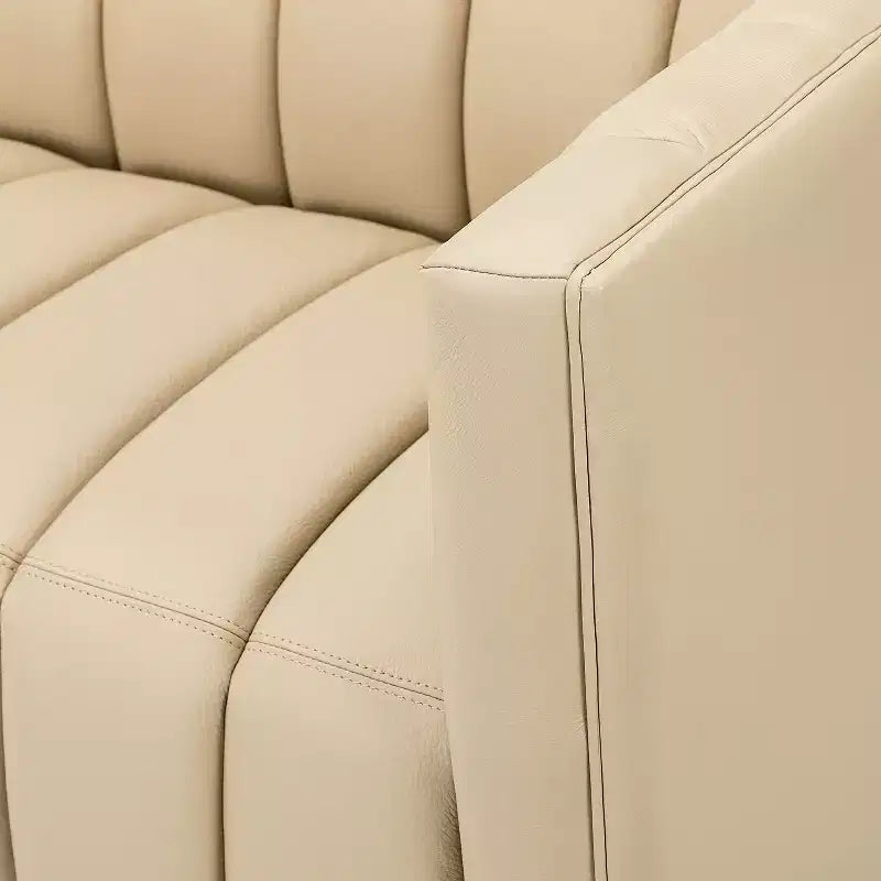 Canapé 83 en cuir véritable avec coutures capitonnées